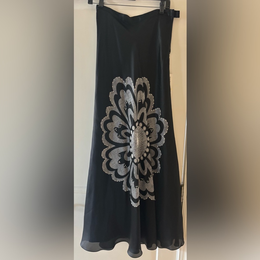 100% silk lined long skirt.  Black and Silver Embellished A-Line Skirt